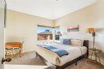 3rd bedroom suite with a king bed on the main level of Oak Street House