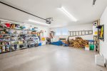 Garage with EV charger at Oak Street House