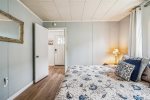 1st bedroom with king bed at Cape Escape