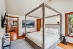 Primary bedroom with king bed at Puffin`s on Larch