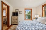 Second bedroom with queen bed at Puffin`s on Larch