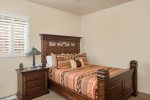 Bedroom 2 is beautifully furnished with a queen size bed