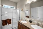 The shared bathroom has a large walk-in shower