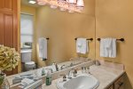 The en-suite bathroom is luxurious with double vanities