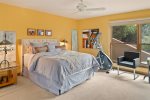 Bedroom 3 is on the lower level with a queen bed and home office space