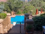 The clubhouse features a swimming pool and outdoor deck with patio furniture and BBQ area