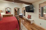 A view of the guest room through to the family room