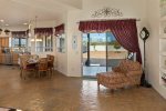 A view from the living area to the dining and kitchen