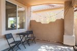 Quiet outdoor patio enclosed courtyard with beautiful rosebushes