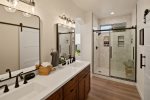 Double vanities and large walk-in shower