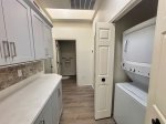 Private laundry space with washer and dryer