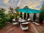 The patio boasts of R&R, private, peaceful and comfortable - wide umbrella for bright days