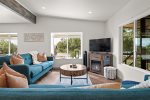 The living area is open plan with plenty of space to unwind with friends and family 