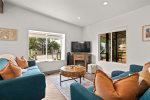 Cozy up for a movie night and enjoy the modern electric fireplace