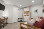 Bedroom 2 has a Trundle Bed with 2 twins, a Large Flat Screen Smart TV, and a laptop-friendly workspace.