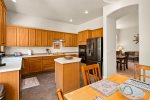 The kitchen is spacious and fully-equipped with modern appliances and amenities