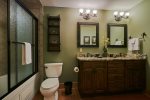 Private, master bath granite countertop, double vanity, tiled Jacuzzi tub/shower combo