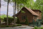 Grandfather Mountain is the backdrop for this charming cabin.  Views are not visible until leaves fall..