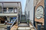 exterior steps up to Unit C on the right side of building