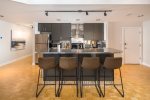 fully equipped kitchen with bar seating