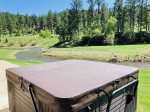 6-8 person hot tub with beautiful creek views