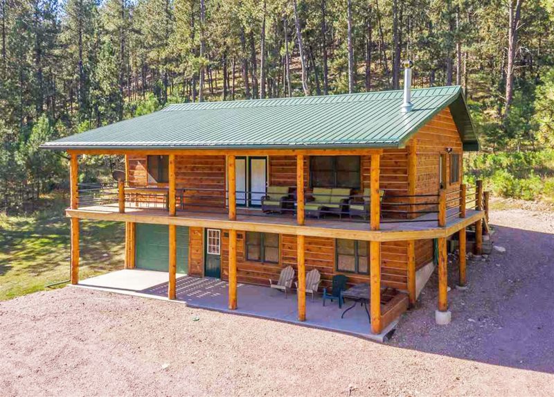 Secluded Cabin In The Forest Surrounded By Black Hills Beauty