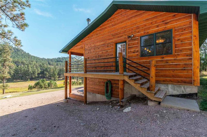 Secluded Cabin In The Forest Surrounded By Black Hills Beauty