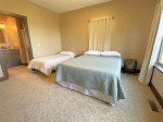 Second bedroom with queen and twin beds