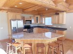 Kitchen with additional seating at the counter 