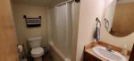 Upstairs bathroom with a shower/tub combo.