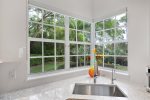 Private Landscape View to Rear Yard from Kitchen Sink