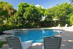 Plenty of Lounge Chairs surrounding the pool deck.