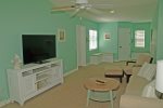 Second floor Living Room with seating and Flat Screen TV.