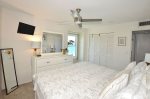 Primary Bedroom with Ceiling Fan & TV