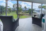 Comfortable Balcony Furniture with View towards Community Clubhouse & Pool