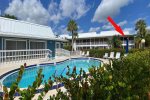 Screened Balcony Overlooking Community Swimming Pool and Clubhouse