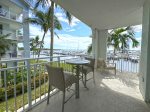 Large Corner Balcony View with 2-top table and bar stools