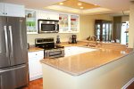 Kitchen with Granite Counter Tops & Stainless Steel Appliances