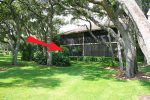 Ground Floor Left Side Screened Patio Marked with Arrow