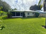 Direct access from Screened Patio to Back Yard.