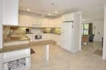 Open Kitchen with granite counter rops.