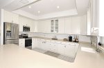 Kitchen with stainless steel appliances.