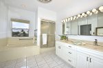 Ensuite Bathroom for Main Bedroom 5 with both tub & enclosed shower.