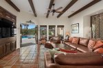 Family Room Has 65 Inch TV and Opens to Pool