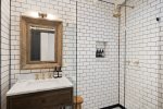 En Suite Bath With Walk-In Shower With Floor-To-Ceiling Tile