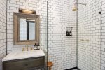 En Suite Bath With Walk-In Shower With Floor-To-Ceiling Tile