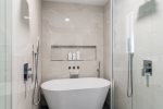 Master Bathroom Ensuite with Stand Alone Bathtub And Two Waterfall Shower Heads