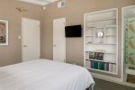 Queen Bed, 32 Inch TV, Built-In Bookcase In Guest Bedroom Three