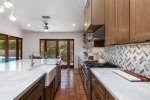 Stylish Fully-Equipped Kitchen With Breakfast Nook, Thermardor Appliances, Wine Refrigerator