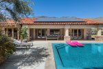 Expansive Covered Patio Features Outdoor Dining For Eight